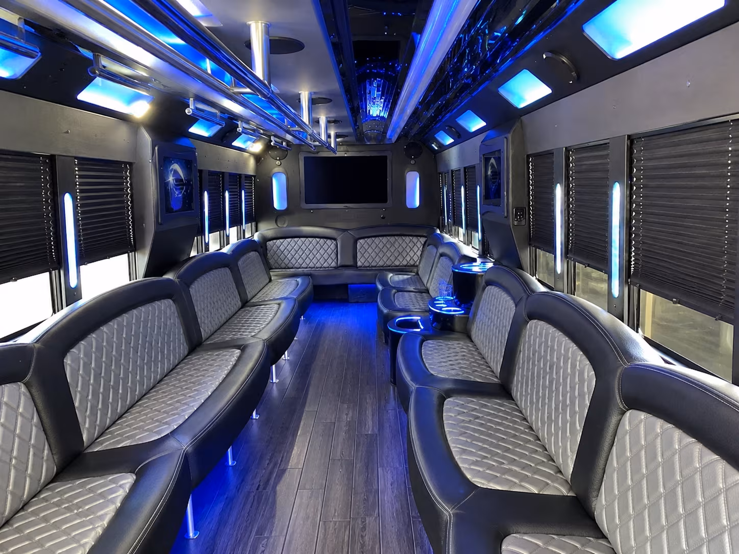 Wedding guests seated inside a party bus serving Dayton